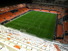Where are the fans? Empty seats everywhere in Valencia, Spain, as that club hosts Atalanta of Italy in a Champions League Round of 16 match on Tuesday.