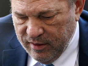 In this Feb. 24, 2020, file photo, film producer Harvey Weinstein arrives at the New York Criminal Court during his ongoing sexual assault trial in the Manhattan borough of New York City.