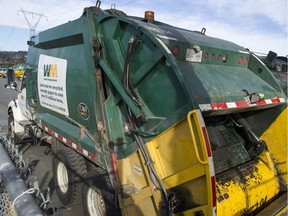 Waste Management garbage trucks in Vancouver.
