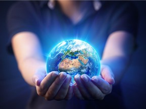 Artist's rendering of Earth in hands for Earth day. Getty Images files. For 0422 earth day virtual  [PNG Merlin Archive]