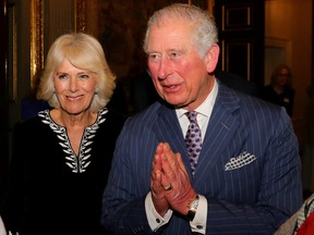 Prince Charles and Camilla, Duchess of Cornwall attend the Commonwealth Reception at Marlborough House, in London, March 9, 2020. (Aaron Chown/Pool via REUTERS/File Photo)