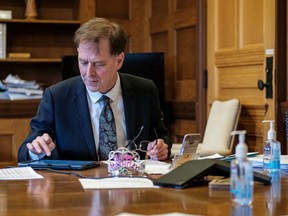 Health Minister Adrian Dix works on COVID-19 pandemic response planning in his office on his birthday April 21, 2020.