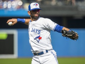 Toronto Blue Jays outfielder Jose Bautista stretches before a game against the New York Yankees on September 24, 2017. (Ernest Doroszuk/Postmedia Network)