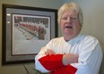 Pat Stapleton stans next to a photo of Team Canada at the 1972 Summit Series in 2010.. Mike Hensen/Postmedia files