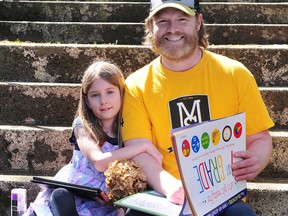 Dal Watson and his daughter Savannah have turned to online learning in an attempt to prevent the spread of COVID-19.