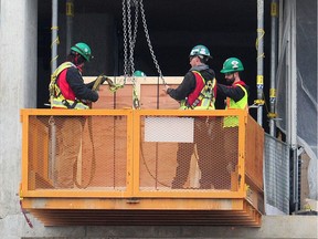 Construction workers on the job during the COVID-19 pandemic, in Vancouver.