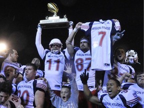 The SFU Clan celebrate their 27-20 victory over UBC in the 33rd annual Shrum Bowl game on Oct. 8, 2010 at Thunderbird Stadium.