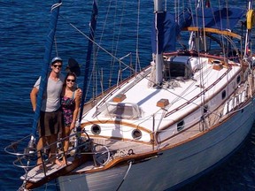 Elena Manighetti and Ryan Osborne are pictured aboard their boat.
