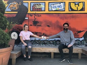 David Evans, owner of Stick in the Mud coffee shop in Sooke, and his daughter, Aila Evans, outside the shop last week. Evans lost business and still hasn't re-opened beyond offering takeout and delivery.