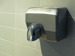 Hand dryer in a public washroom.