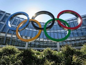 In this file photo taken on March 24, 2020 Olympic Rings are seen a the headquarters of the International Olympic Committee (IOC) in Lausanne amid the spread of the COVID-19.