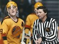 Former Vancouver Canucks star Tony Tanti loses an argument in 1988 with linesman Jim Christison over a disputed goal. Tanti scored 204 goals in a five-year stretch with the Canucks.