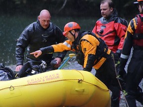 First responders launch a boat on Foley Lake Sunday afternoon.