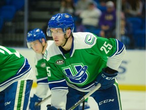 More than half the teams in the AHL are owned by their NHL clubs. New York's Utica Comets are not one of those. Pictured is Comet Brogan Rafferty.