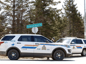 RCMP block the entrance to Portapique Beach Road after the search for mass shooter Gabriel Wortman ended, April 19, 2020.