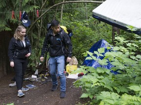 Union Gospel Mission Mobile Mission outreach workers Lemuel Poon and Anmari Wilde in Surrey on Friday, May 22, 2020.