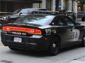 A woman told police that a man struck in her in the head with a bag full of plastic bottles while she waiting for a bus downtown Vancouver on May 7.