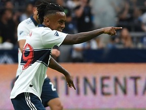 Vancouver Whitecaps midfielder Jordy Reyna (29) celebrates after scoring a goal against DC United during the first half at BC Place.