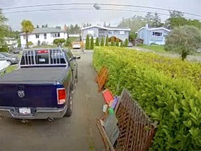 A tornado lifts s trampoline from Saanich yard on Thursday, May 21, 2020.