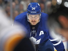 Auston Matthews of the Toronto Maple Leafs waits for a puck drop against the St. Louis Blues during an NHL game at Scotiabank Arena on October 7, 2019 in Toronto, Ontario, Canada.