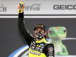 Ryan Blaney, driver of the #12 Menards/Sylvania Ford, celebrates in Victory Lane after winning the NASCAR Cup Series GEICO 500 at Talladega Superspeedway on June 22, 2020 in Talladega, Alabama.