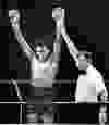 Michael Olajide raises his arms in victory after beating Venezuala’s Elio Diaz on Nov. 28, 1985 at the Pacific Coliseum. The win improved the middleweight to 15-0 and the boxing world took notice.