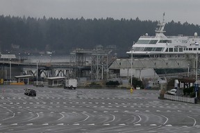 The Swartz Bay ferry terminal sites nearly empty during the COVID-19 pandemic as health officials discourage travel for all but essential reasons. BC Ferries says the drop in traffic has forced it to cut sailings at 11 coastal routes.