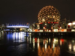 MARCH  28 2015. Earth hour had lights out at Science World at 8:30 pm  in Vancouver, B.C. on March 28,  2015.  BC Place lights stayed on.(Steve Bosch  /  PNG staff photo)  00035616A.