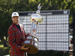 Daniel Berger celebrates winning the Charles Schwab Challenge golf tournament at Colonial Country Club.