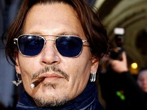 Actor Johnny Depp leaves the High Court in London, February 26, 2020.