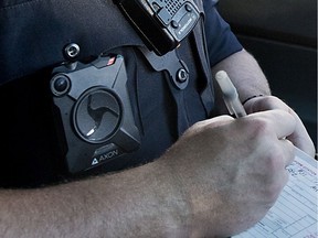METHUEN, MA - AUGUST 20: Methuen police officer Nick Conway wore a body camera while he wrote a citation on Saturday August 20, 2016. In May, the Methuen Police Department, with little fuss, became the first major law enforcement agency in Massachusetts to start using body cameras, putting them on 47 patrol officers after a six-month trial run last year.