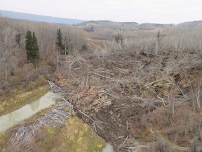 A slow moving landslide is seen inching down a hillside in northern British Columbia, prompting the evacuation of nearby Old Fort, B.C., in an undated handout photo. A resident of a small community on the banks of British Columbia's Peace River says he's concerned that if he leaves, he won't be able to come home.