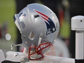 A New England Patriots helmet rests on the sidelines during the AFC Championship game against the Kansas City Chiefs at Arrowhead Stadium.