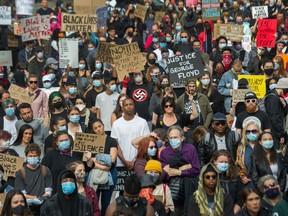 People protest during an anti-racism rally in front of the  Vancouver Art Gallery in Vancouver, B.C., May 31, 2020.