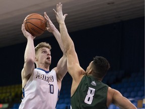 Grant Shephard of the UBC Thunderbirds, left, has committed to play for the Carleton Ravens in Ottawa.