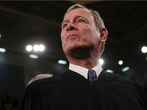 U.S. Supreme Court Chief Justice John Roberts waits for U.S. President Donald Trump's State of the Union address to a joint session of the U.S. Congress in the House Chamber of the U.S. Capitol in Washington, U.S. February 4, 2020. The US Supreme Court rejected Louisiana's restrictions on abortion June 29, 2020 in a key victory for abortion rights activists. The conservative-leaning court split 5-4 on the decision overruling a state law that requires doctors who perform abortions to have admitting privileges at a nearby hospital.