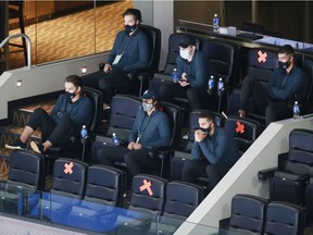 Vancouver Canucks scratch players watch an exhibition game against the Winnipeg Jets prior to the 2020 NHL Stanley Cup Playoffs at Rogers Place on July 29, 2020 in Edmonton, Alberta.