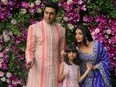 Actor Abhishek Bachchan, his wife actress Aishwarya Rai and their daughter Aaradhya pose during a photo opportunity at the wedding ceremony of Akash Ambani, son of the Chairman of Reliance Industries Mukesh Ambani, at Bandra-Kurla Complex in Mumbai, India, March 9, 2019.