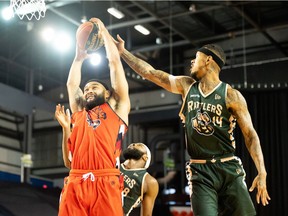 Fraser Valley Bandits forward Cam Forte pulls in a rebound over Edmonton's Mathieu Kamba during their opening game at the CEBL Summer Series in St. Catharines, Ont. 
Forte had 28 points and 10 rebounds in the game.