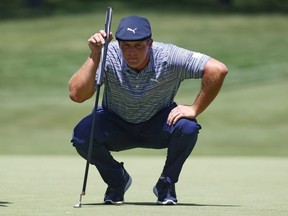 Bryson DeChambeau lines up a putt during the third round of the Rocket Mortgage Classic on July 4, 2020 at the Detroit Golf Club in Detroit.