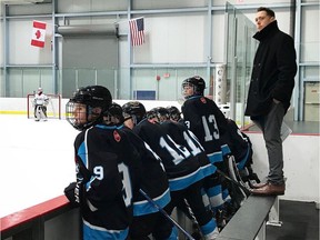 Minor hockey players in Vancouver are waiting to hear when they might be able to hop over the boards and skate on some ice in the city. Pictured here, Vancouver minor hockey players with coach Stephen Gillis.