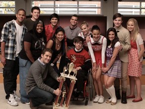 The Glee cast. Pictured back row L-R: Dijon Talton, Cory Monteith, Harry Shum Jr, Mark Salling, and Heather Morris. Front row L-R: Amber Riley, Matthew Morrison (kneeling), Jenna Ushkowitz, Kevin McHale, Naya Rivera, Lea Michele, Chris Colfer and Dianna Agron.