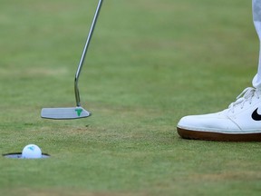 A view of the logo on the putter of Tony Finau as he putts on the 18th green during the final round of The Memorial Tournament at Muirfield Village Golf Club.