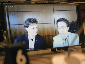 Marc, left, and Craig Kielburger appear as witnesses via videoconference during a House of Commons finance committee meeting in Ottawa on Tuesday.