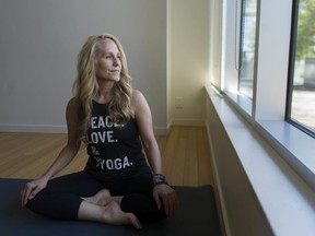 YYoga owner Carey Dillen is pictured in this May 2020 file photo. The company announced Monday it is closing its South Granville location permanently.