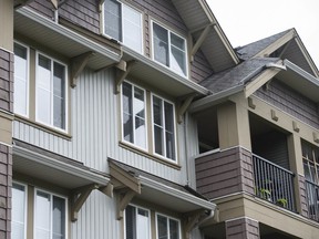 Condo units in the 12000-block of 68th Street in Surrey on July 2. The strata is suing over the alleged improper construction of building overhangs.