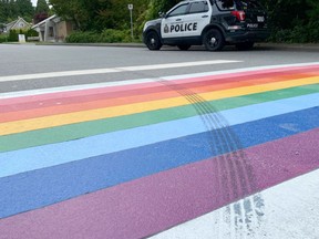 West Vancouver's rainbow crosswalk now has a black tire skid mark running through it.