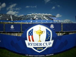 In this file photo taken on September 19, 2018 this photograph shows the Ryder Cup Logo with spectator stands at Golf National in Guyancourt.