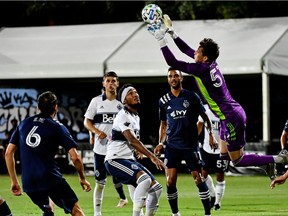 Vancouver Whitecaps goalkeeper Thomas Hasal (51) makes a save against the Sporting Kansas City during the first half at ESPN Wide World of Sports Complex.