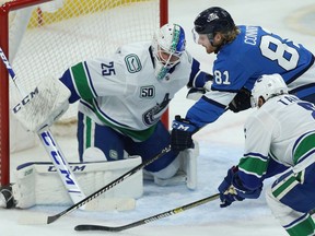 Winnipeg Jets forward Kyle Connor is stopped by Vancouver Canucks goaltender Jacob Markstrom in Winnipeg on Tues., Jan. 14, 2020.